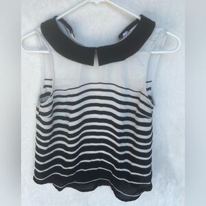 Elle Black and White Asymmetrical Sleeveless Blouse